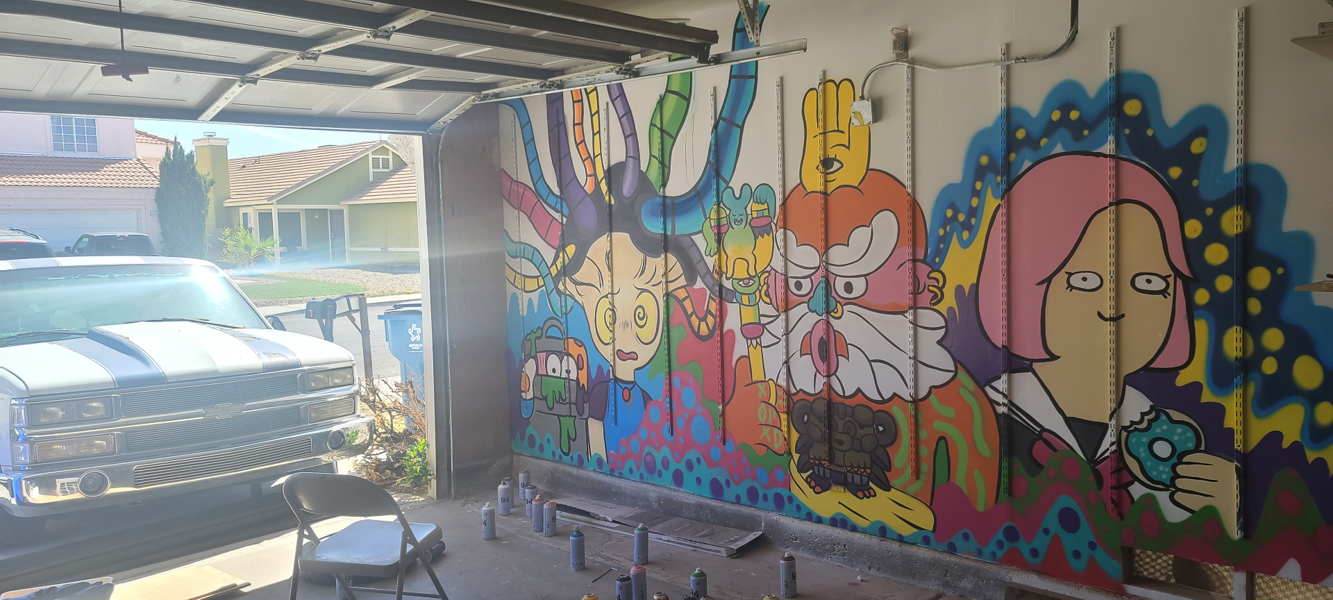 Fun House Garage mural — full daytime view from garage entrance