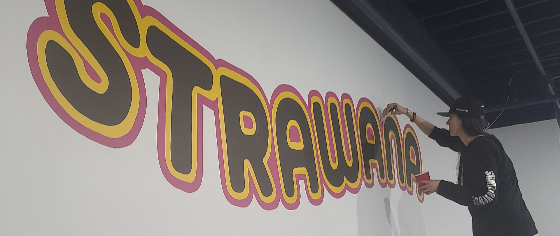 Up & Smoke DC mural — large STRAWANA bubble-letter typography wall in progress